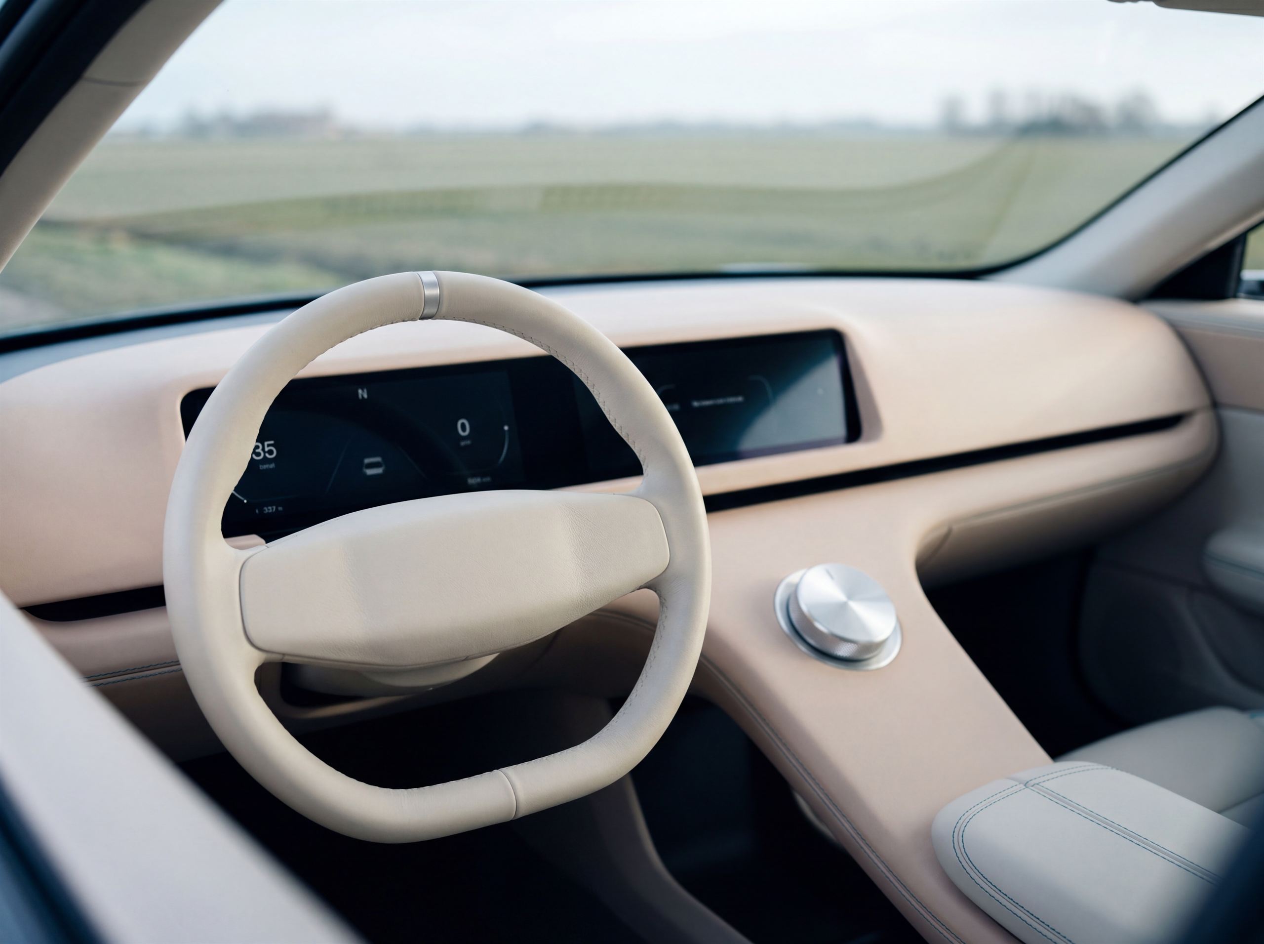 The cream cabin: a single screen and one machined knob